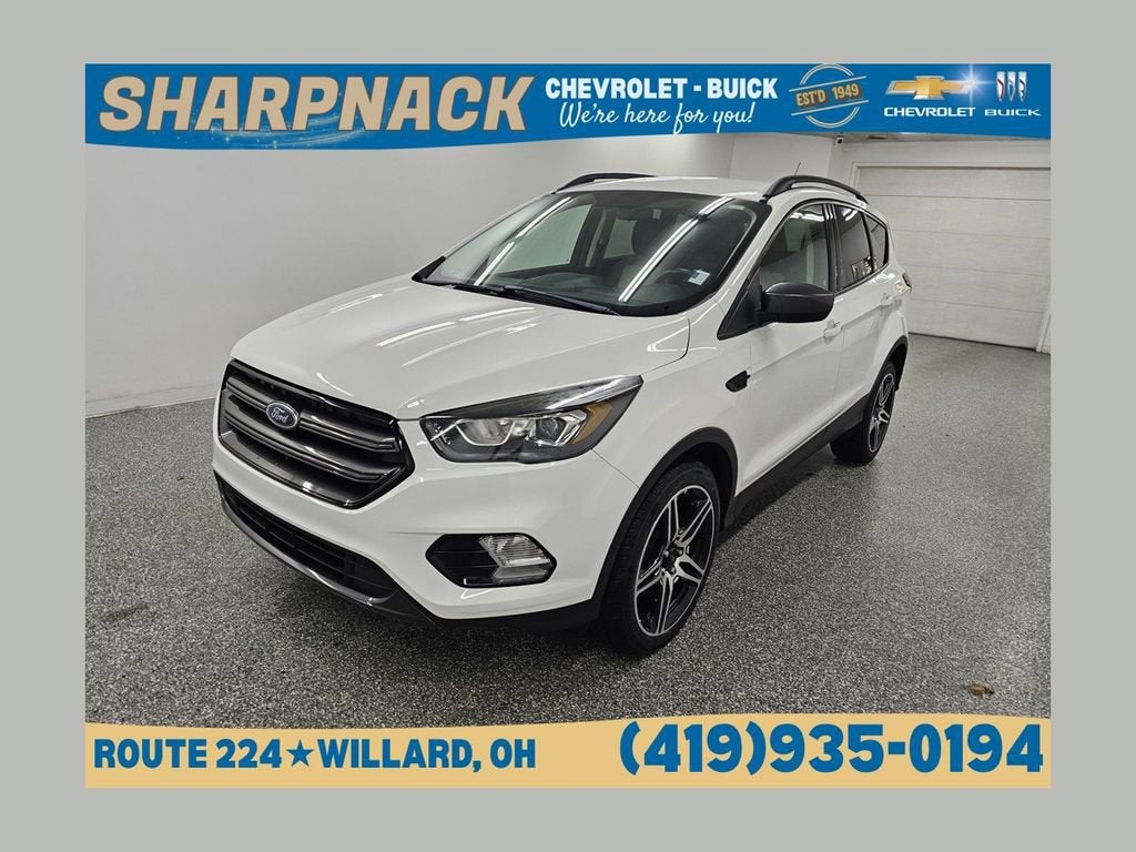 2019 Ford Escape SEL in White — front three-quarter view