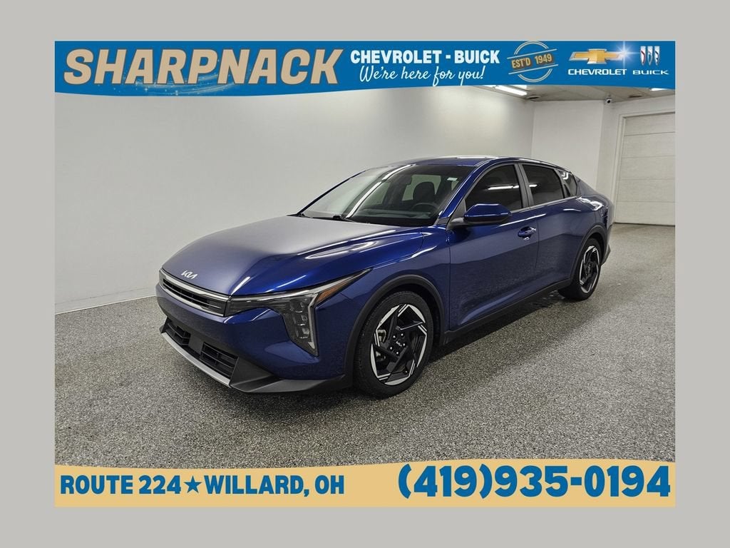 2025 Kia K4 EX in Blue — front three-quarter view