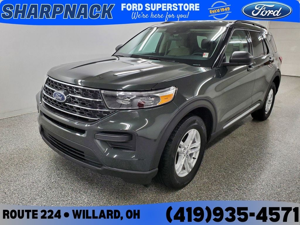 2023 Ford Explorer XLT in Forged Green Metallic — front three-quarter view