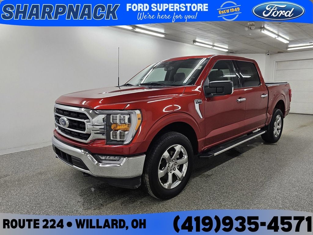 2023 Ford F-150 XLT in Hot Pepper Red Metallic Tinted Clearcoat — front three-quarter view