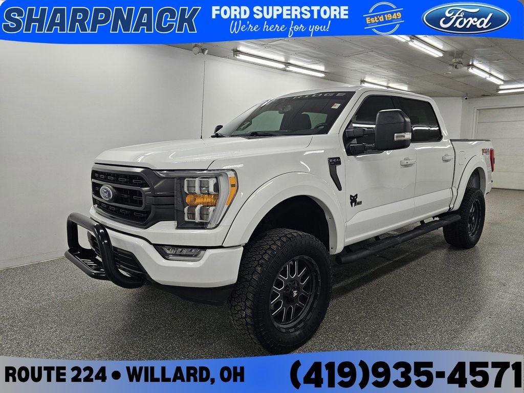 2021 Ford F-150 XLT in Oxford White — front three-quarter view