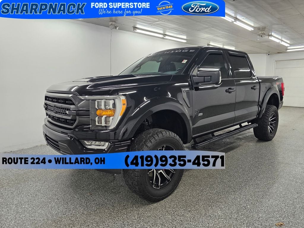 2021 Ford F-150 XLT in Agate Black Metallic — front three-quarter view
